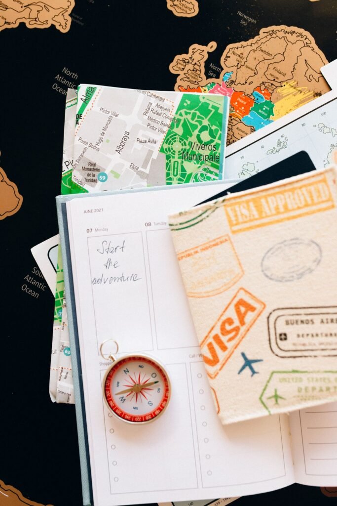 Travel journal notebook with map and travel planning accessories
