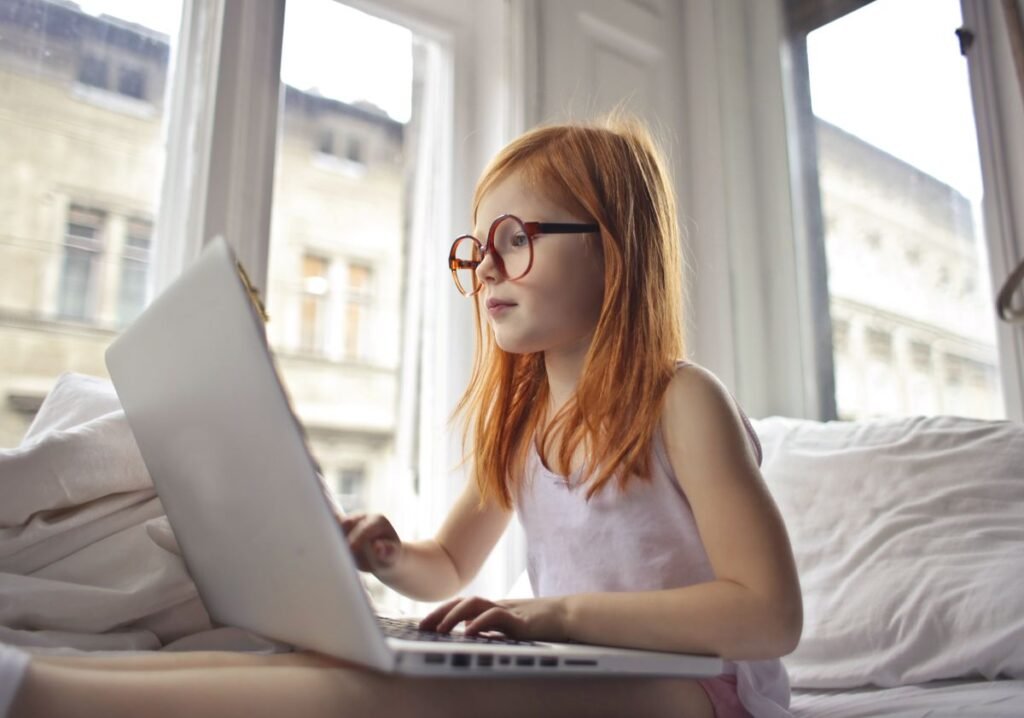 Person watching a movie streaming on a laptop