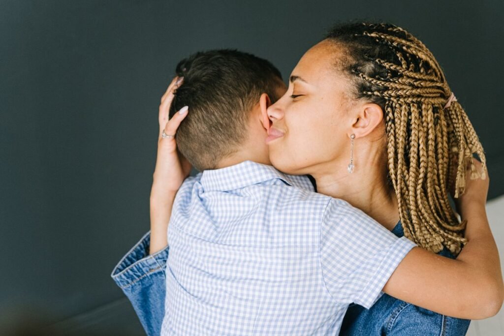 Mother hugging her child affectionately