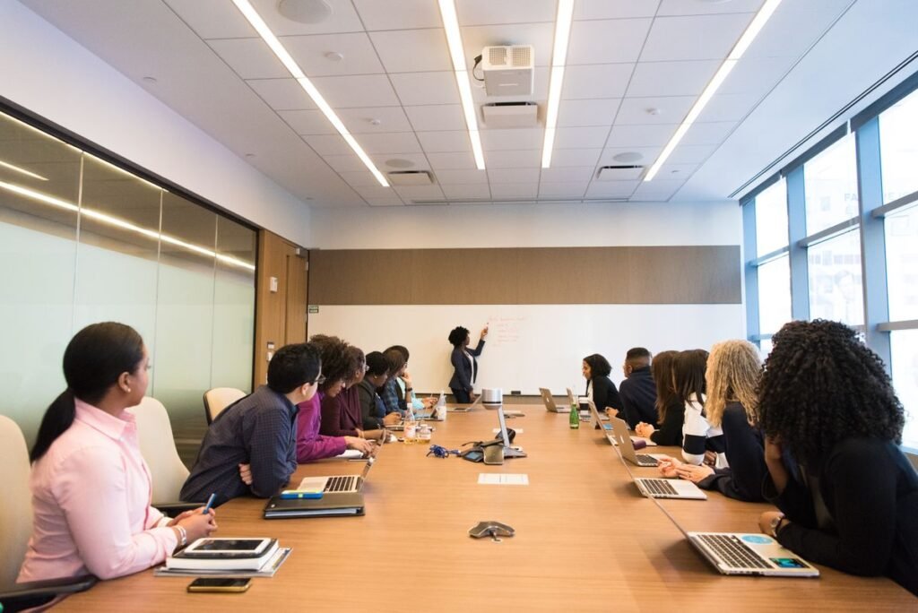 Corporate team discussing enterprise compliance in a conference room