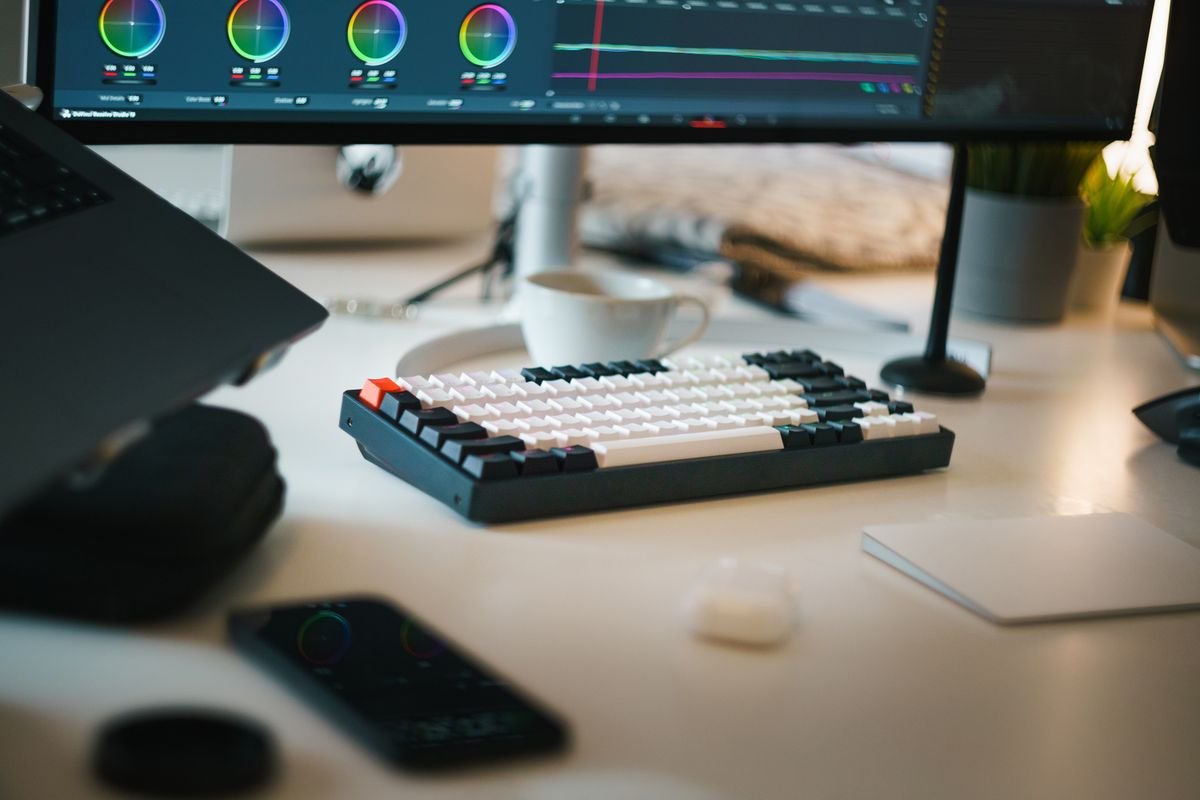 Modern digital workspace with video editing tools on screen