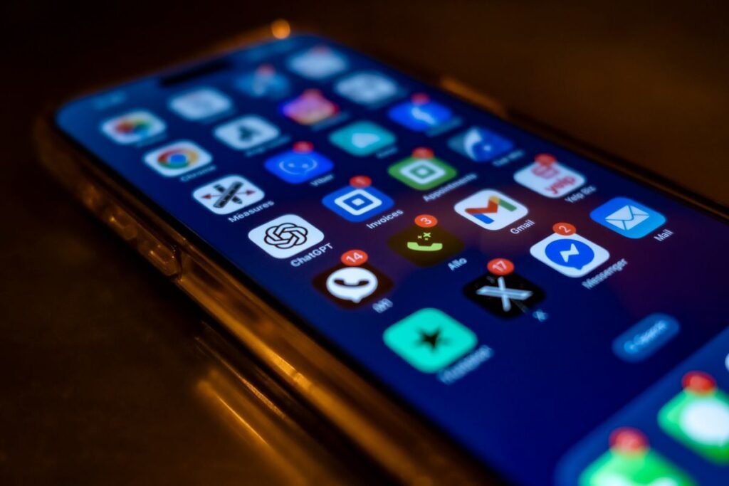 Smartphone screen displaying app notifications, representing screenshot alert features