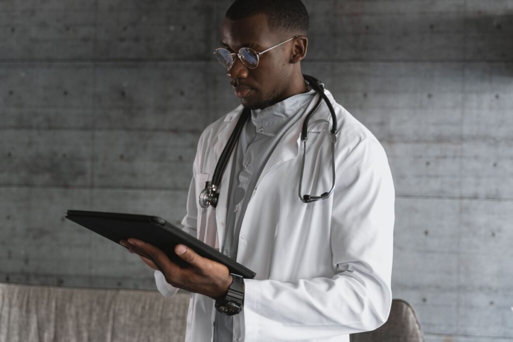 Healthcare professional using a tablet, representing HIPAA compliance