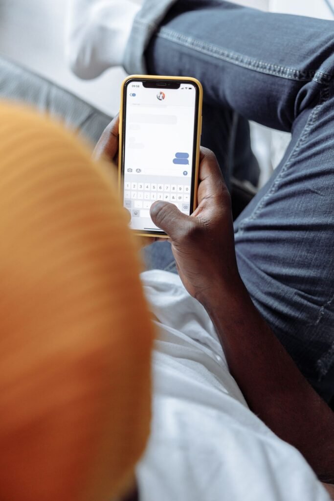 Person texting casually on a smartphone