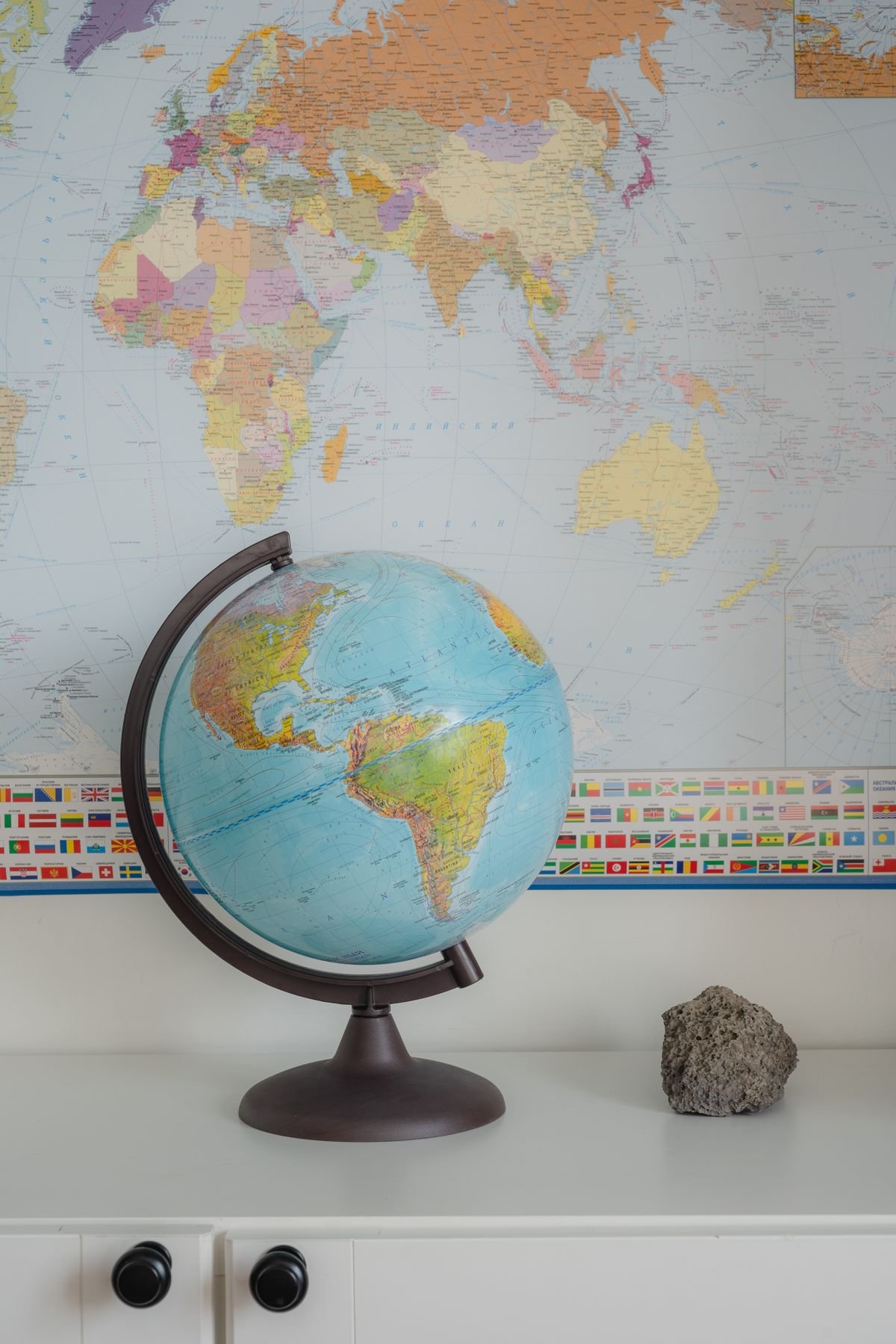 World map and globe, representing an international technology company's global reach