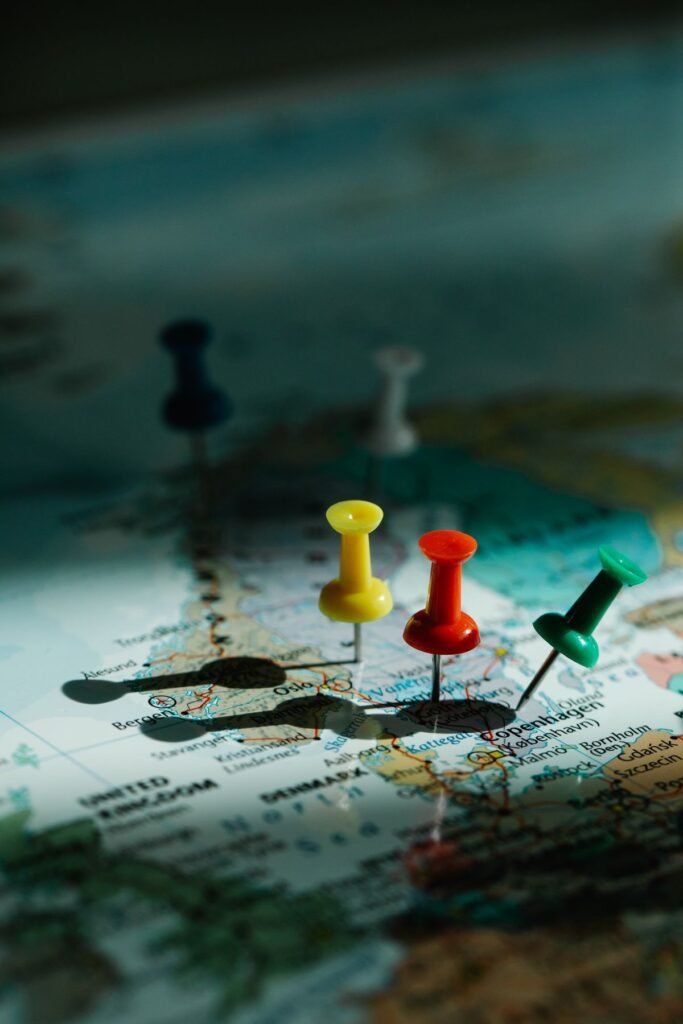 Close-up of pins marking locations on a map