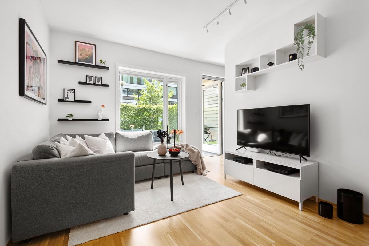 Sleek, minimalist modern living room with a clean TV setup